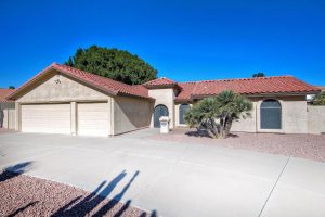 Single story home with 3 car garage