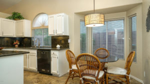 roomy breakfast nook with bayed window area