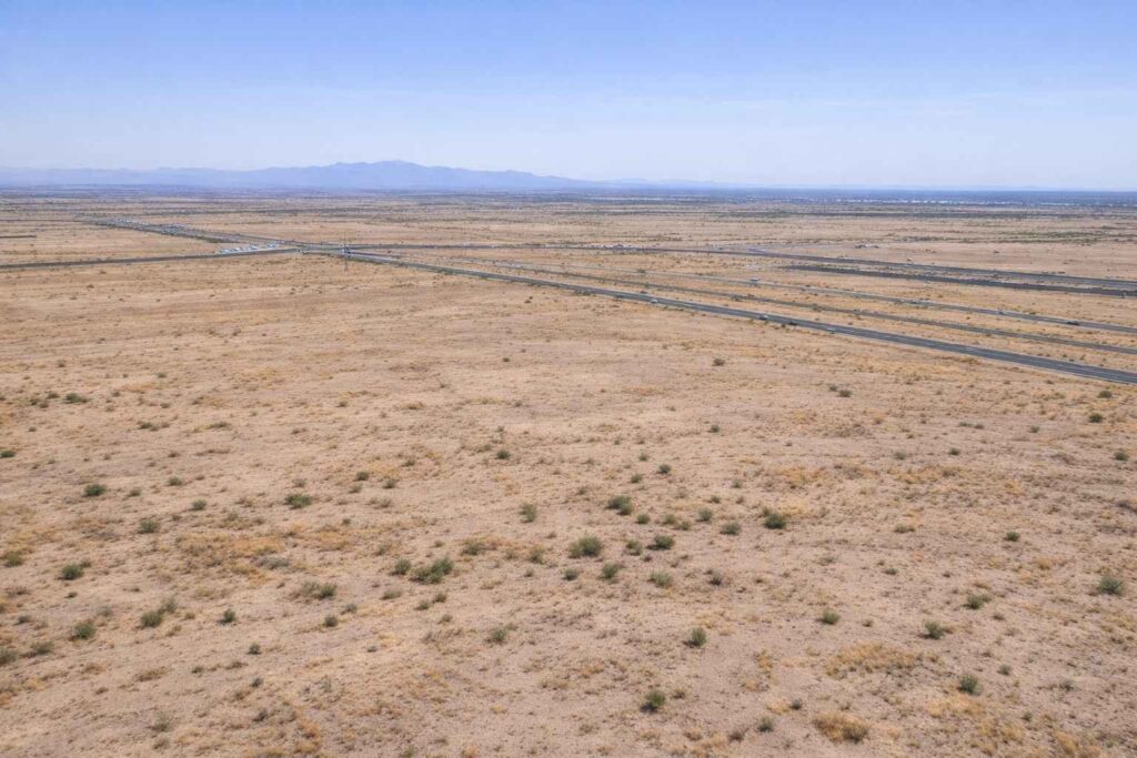 Open desert land near Eloy Arizona showing long-term infrastructure context