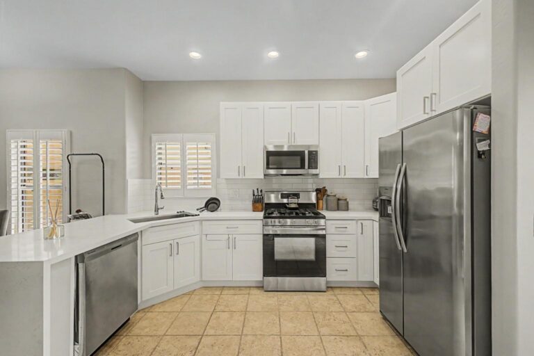 modern kitchen with quartz countertops and new cabinets