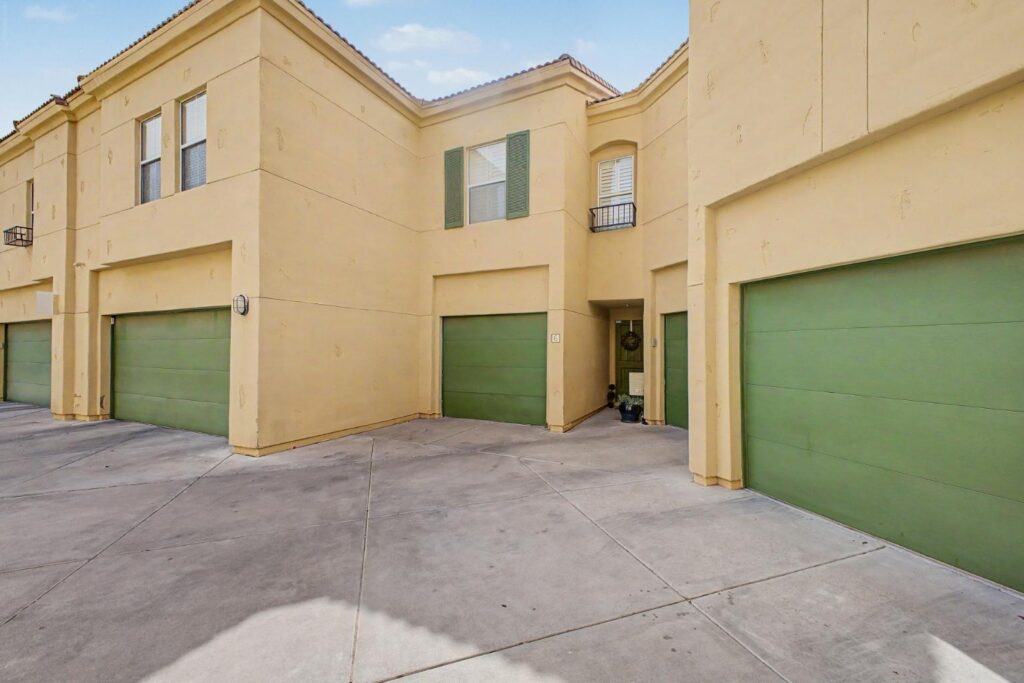Gated Tuscany Courts 3 bedroom townhome exterior with 2-car garage in Ahwatukee Phoenix