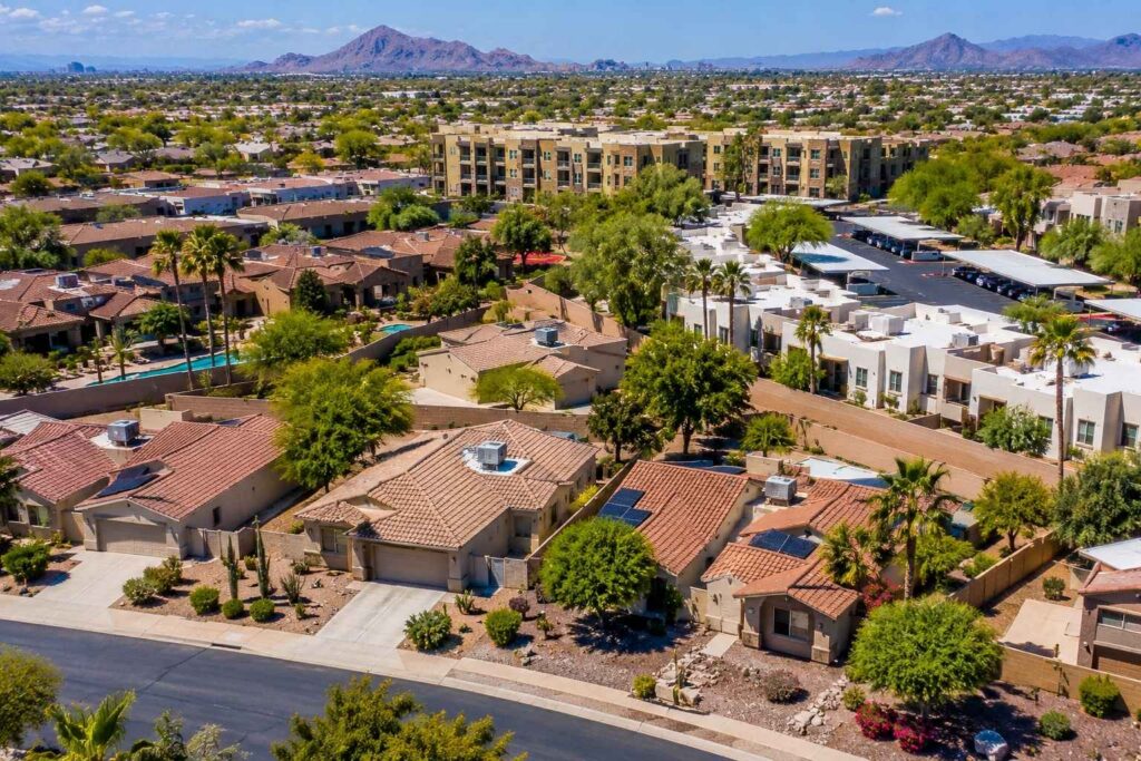 Aerial view of multiple Phoenix-area residential property types in a desert neighborhood