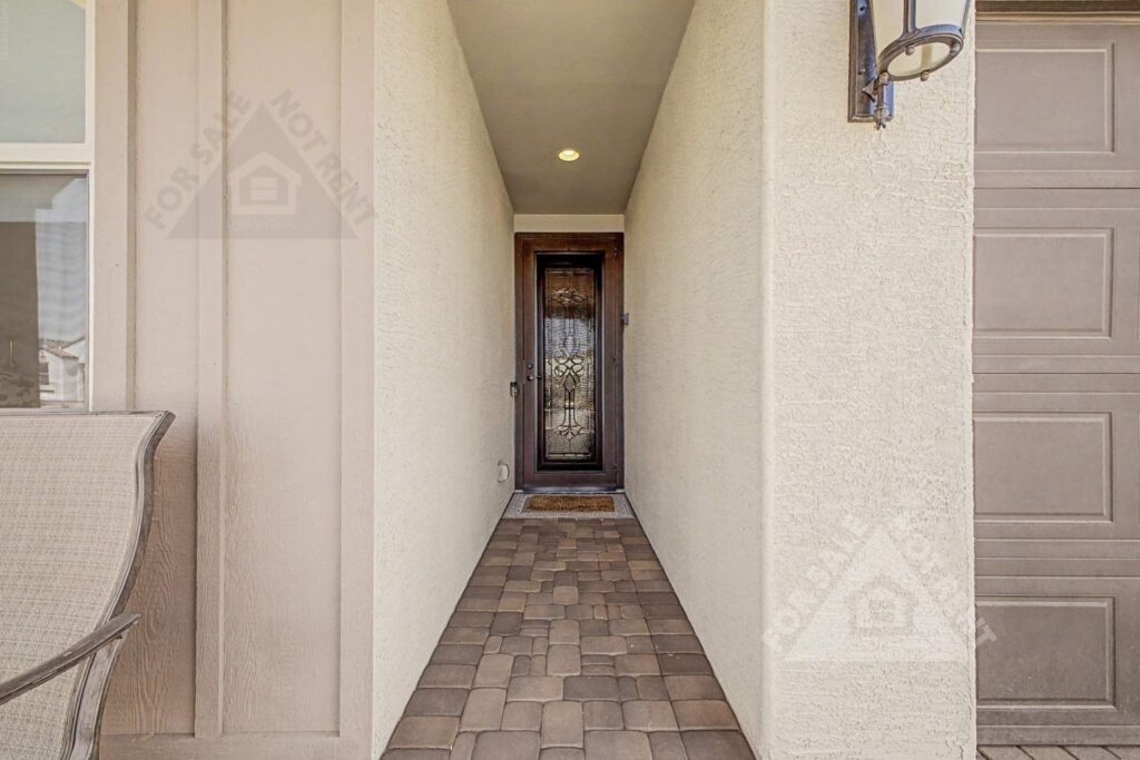 Upgraded front entry door and security door at a CantaMia home